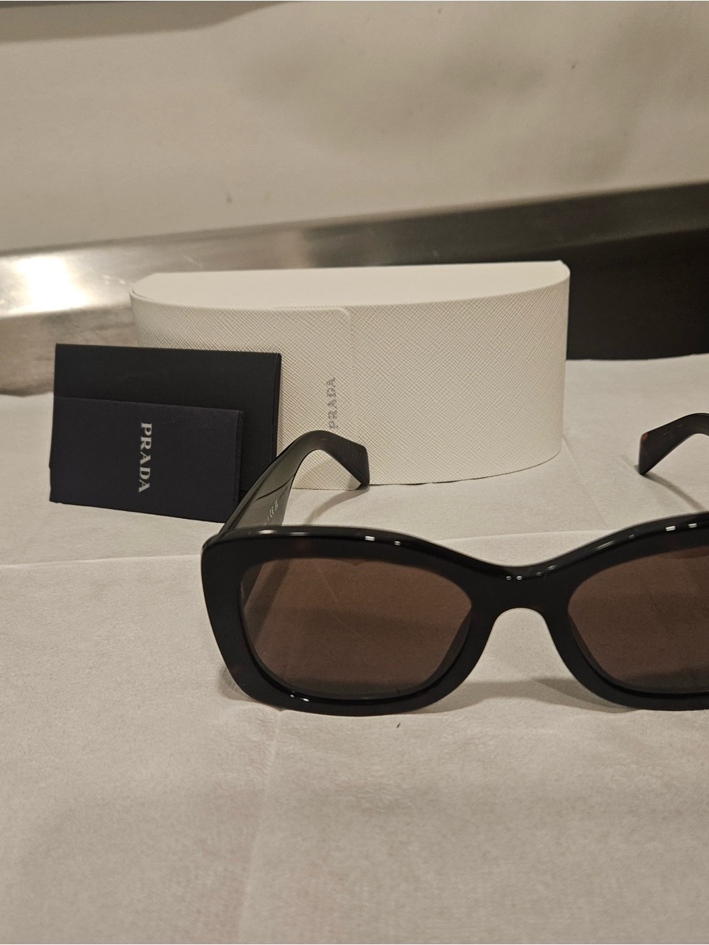 Prada Women’s A08 Black Frame Sunglasses with Brown Lenses